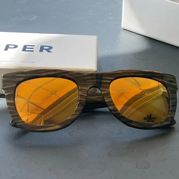 Super X Barney’s New York limited edition sunglasses.